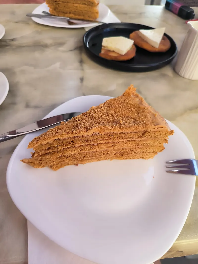 A slice of layered honey cake