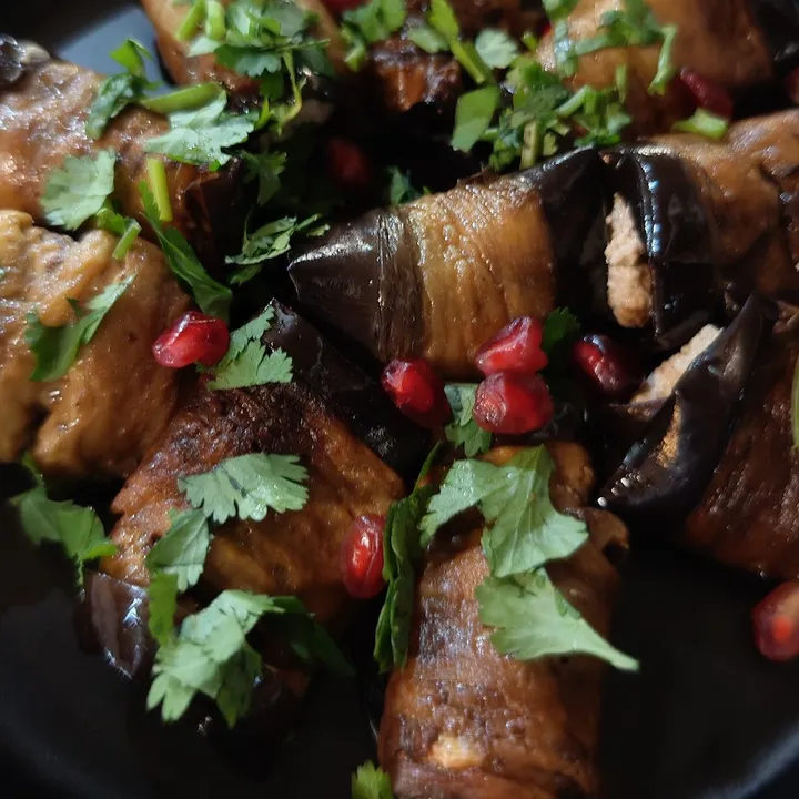 Aubergine rolls with walnuts and pomegranate