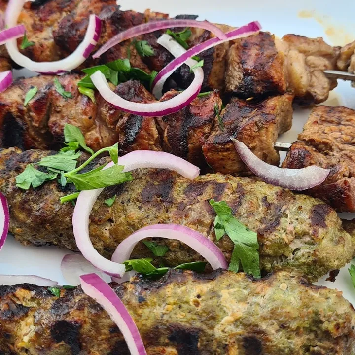 Mtsvadi and lula kebab skewers with onion